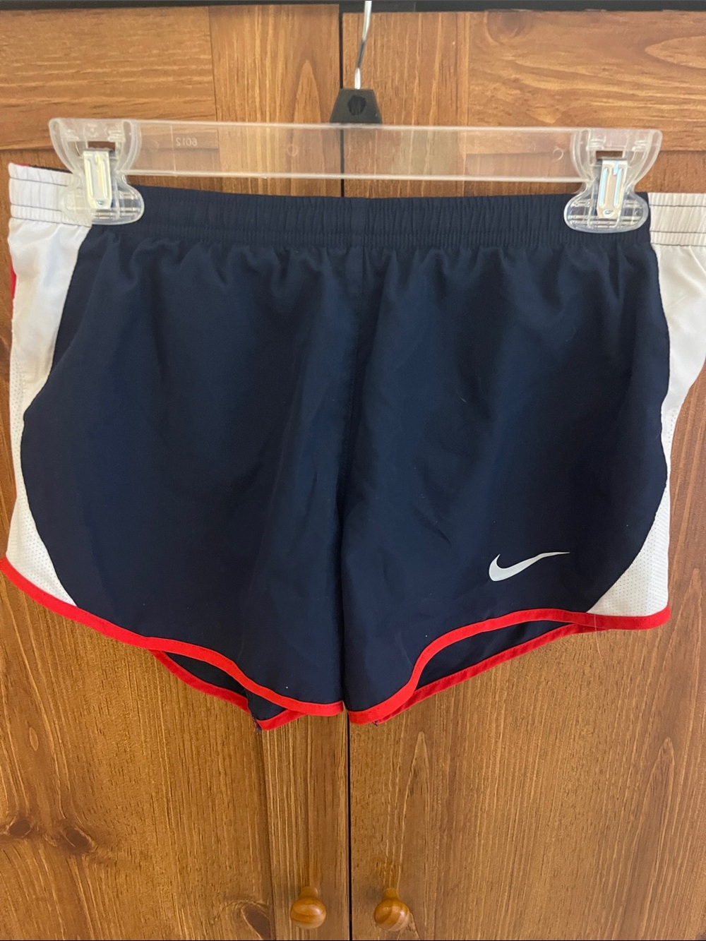 Nike Women's Navy Shorts with Red Trim and White Panels